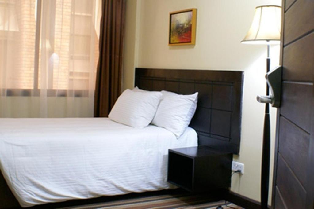 The Clarion Hotel Найробі Номер фото